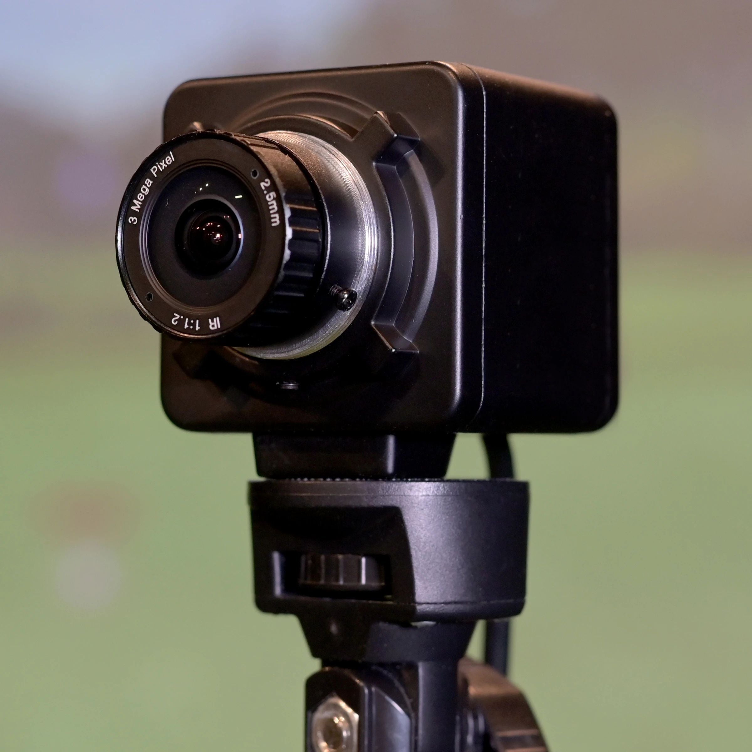 Camera on a tripod with a blurred background