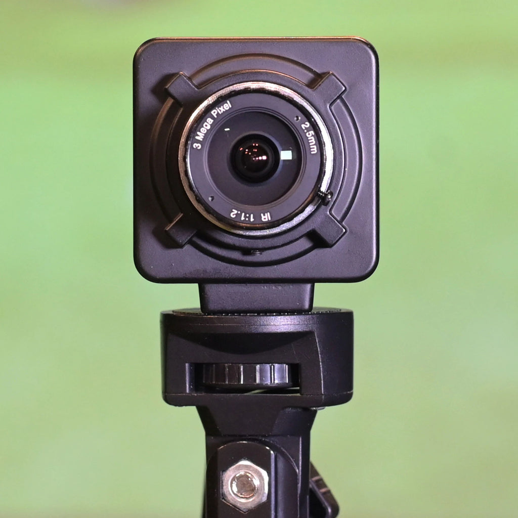 Camera lens with a green gradient background