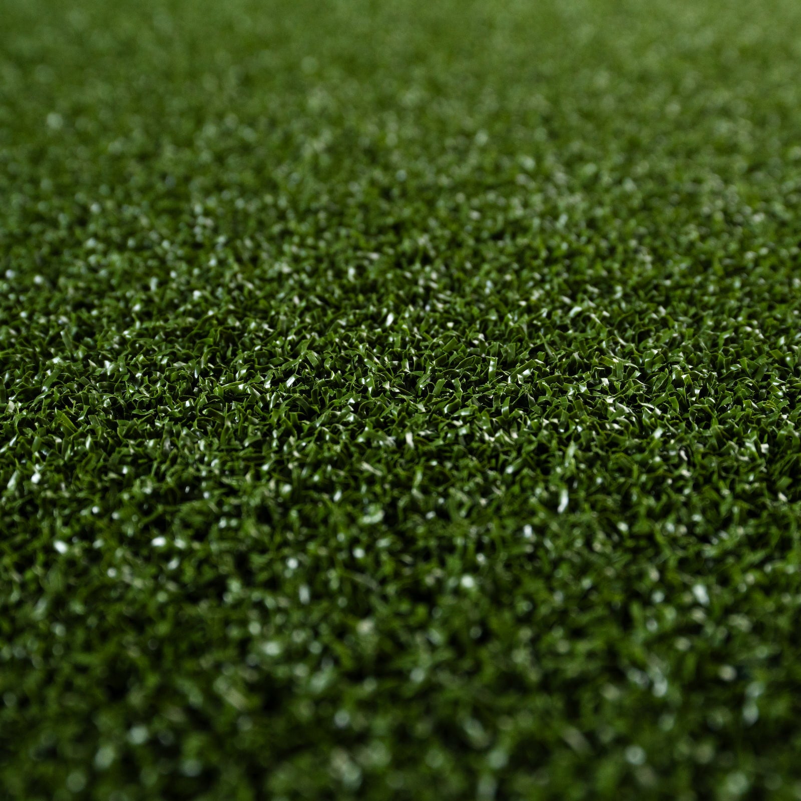 Close-up of artificial grass with a textured surface
