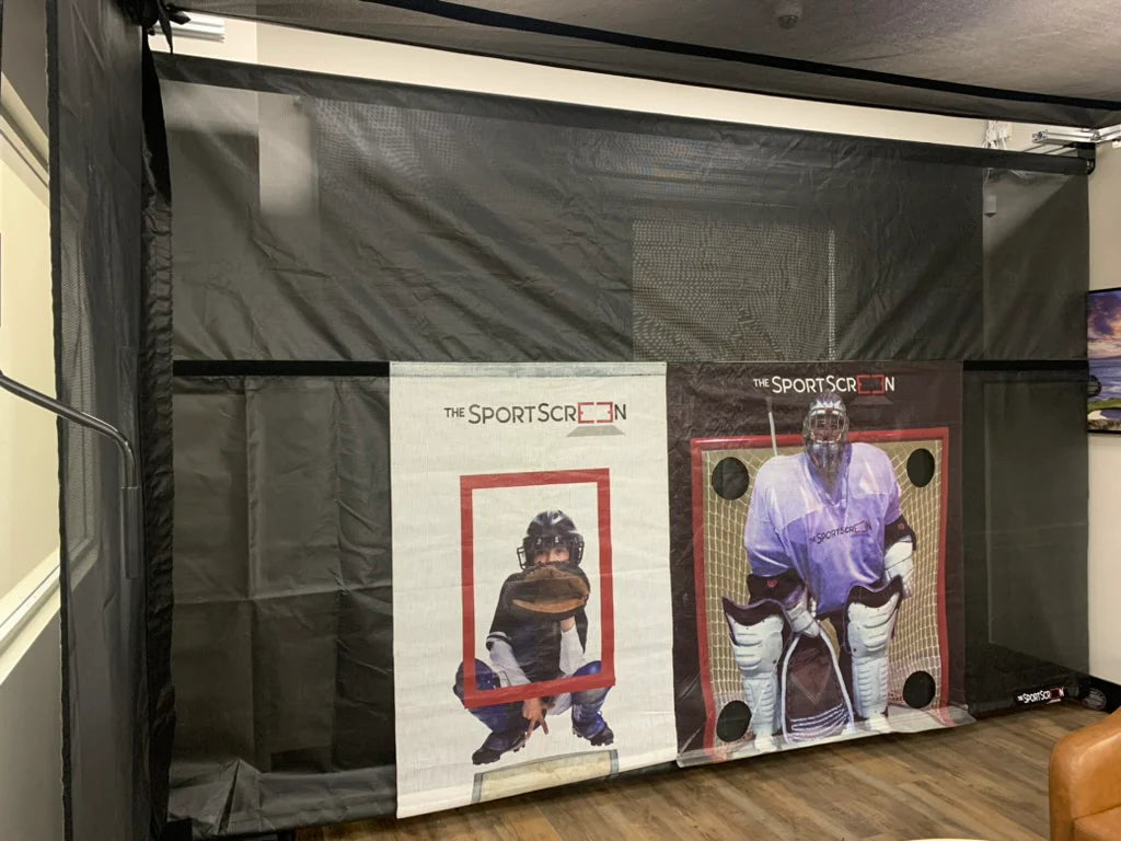 The SportScreen indoor sports practice system with two posters of athletes on a black screen.