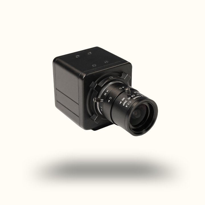 Black camera lens on a white background