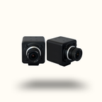 Two black surveillance cameras on a white background
