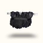 Black fishing net with a white handle on a white background