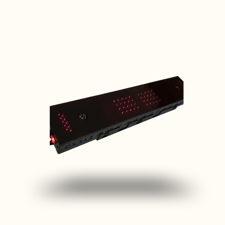 Black electronic device with red LED lights on a white background