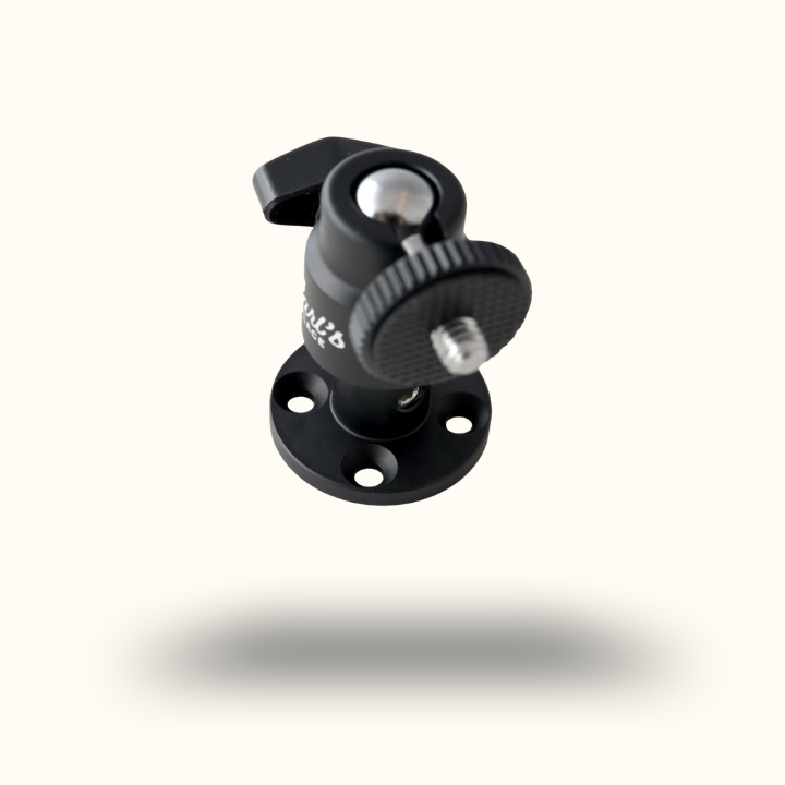Black camera mount on a white background
