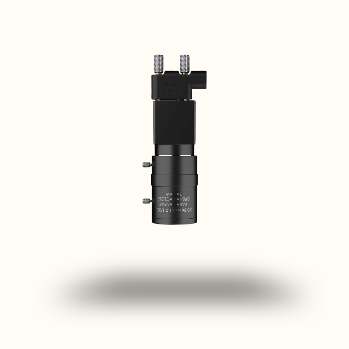 Black mechanical component on a white background