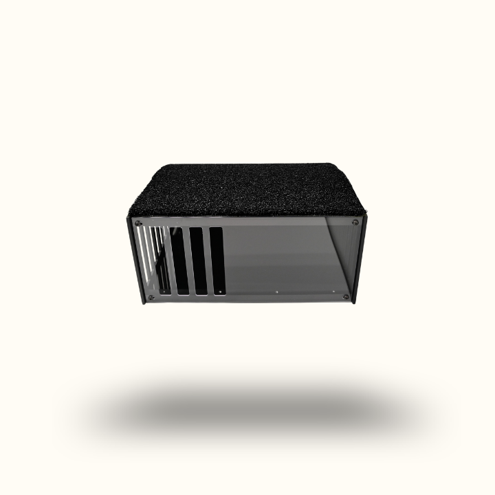Black rectangular object with grid pattern on a white background