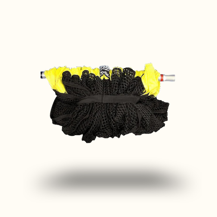 Black cleaning brush with yellow bristles on a white background