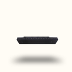 Black rectangular object with multiple slots on a white background