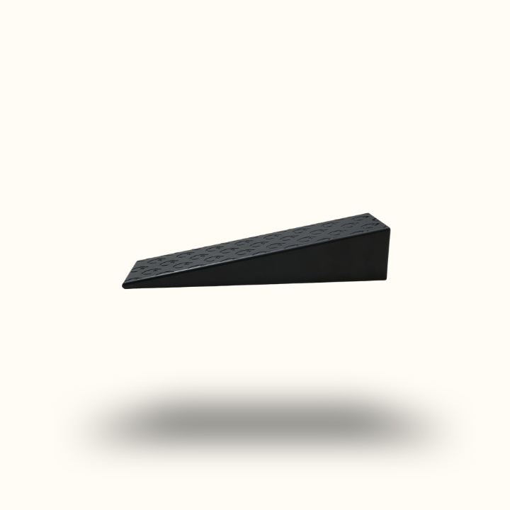 Black wedge-shaped object on a white background