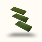 Three green rectangular foam pads on a white background
