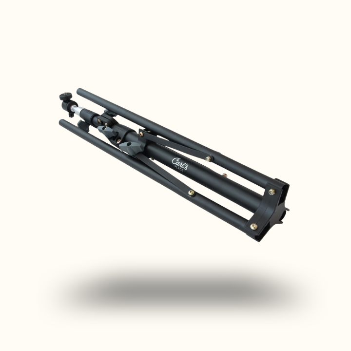 Black metal tripod on a white background