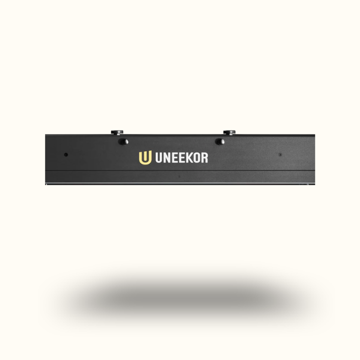 Black rectangular light with 'UNEEEKOR' branding on a white background