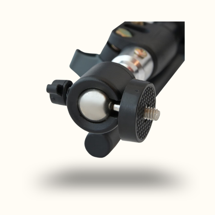 Close-up of a camera flash unit with reflective surface on a white background