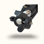 Close-up of a camera flash unit with reflective surface on a white background