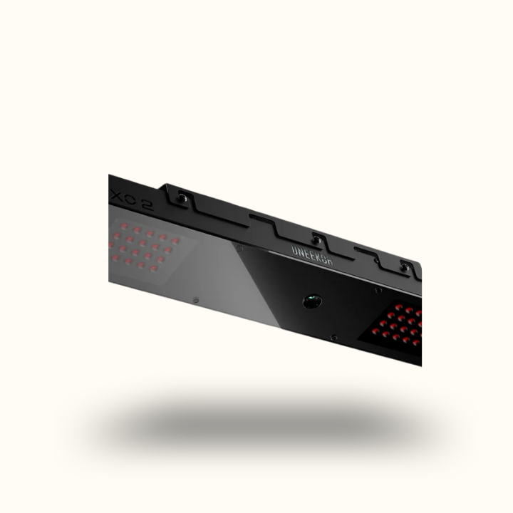 Gaming keyboard with red LED backlit keys on a white background