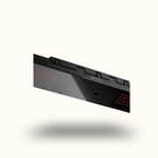 Gaming keyboard with red LED backlit keys on a white background