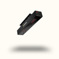 Black rectangular device with red lights on a white background