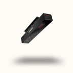 Black rectangular device with red lights on a white background