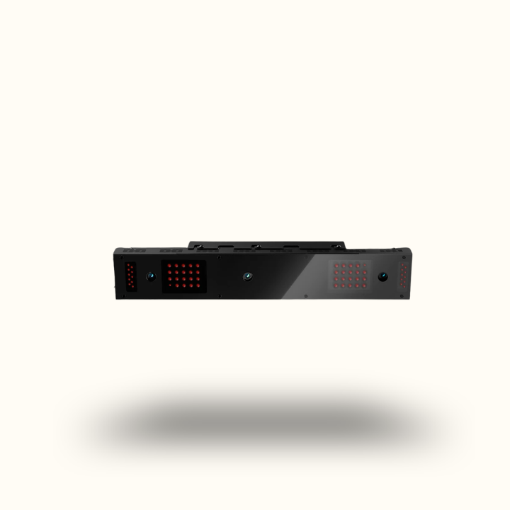 Black electronic device with red LED lights on a white background