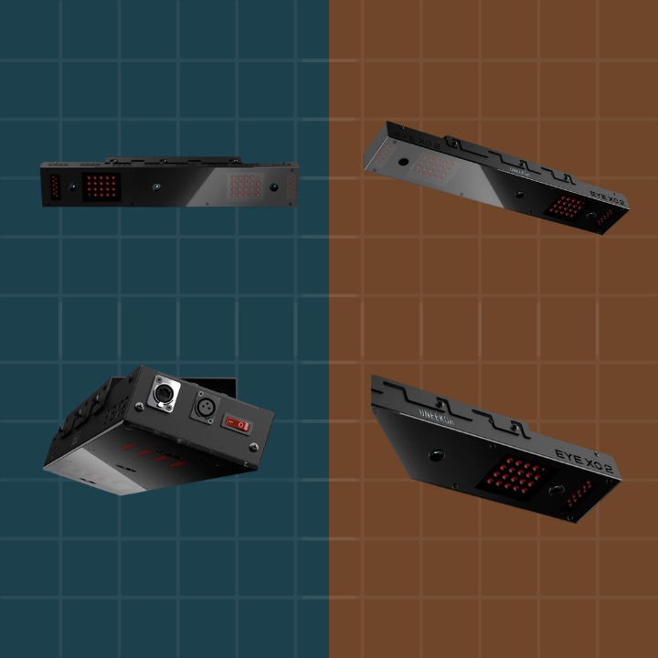 Four different views of a metallic device on a grid background