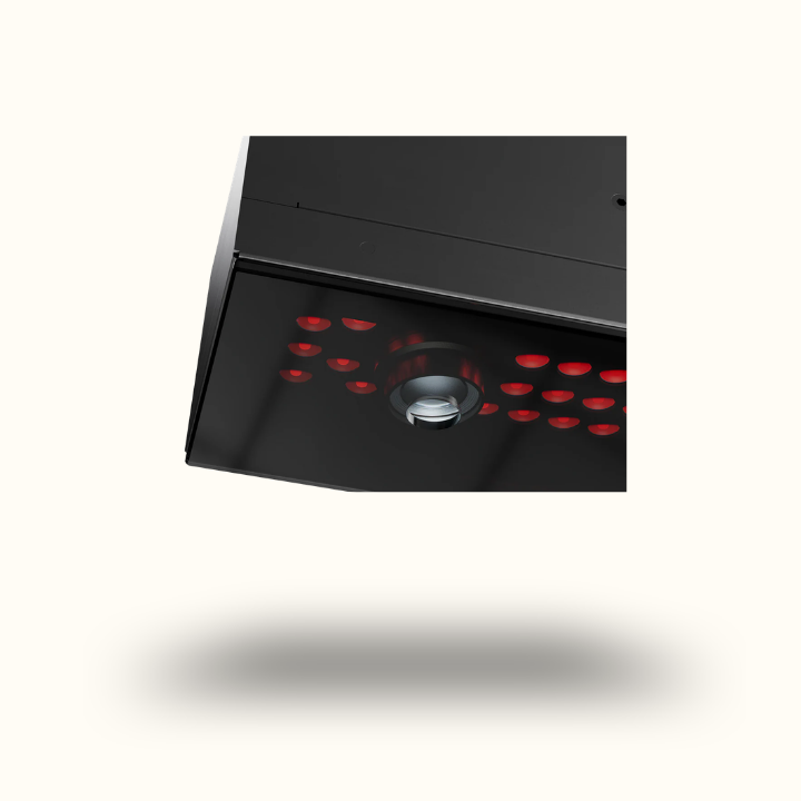 Black electronic device with red LED lights on a white background