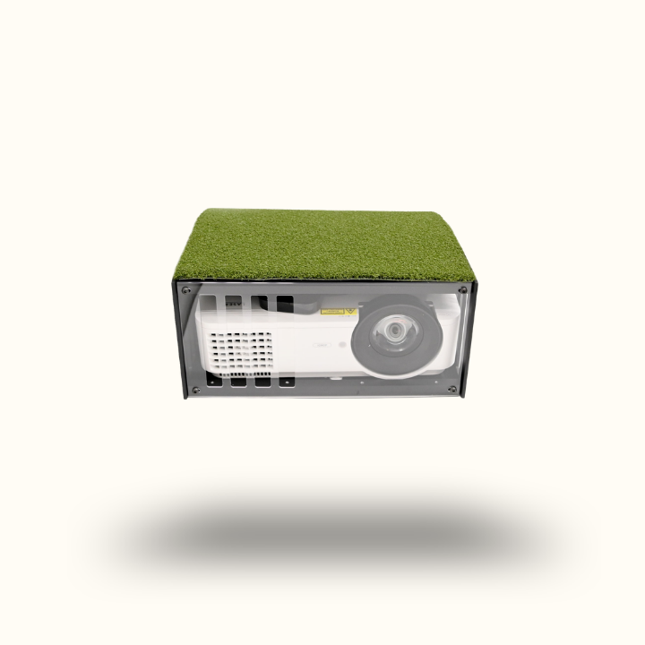 Small electronic device with grass-like top on a white background