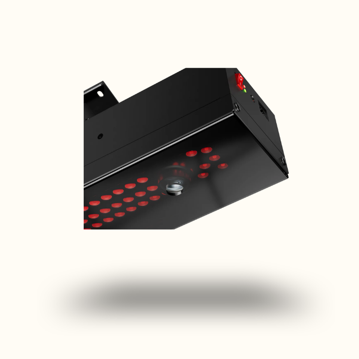 Black electronic device with red LED lights on a white background