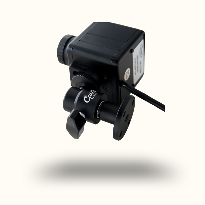 Black camera lens with mounting bracket on a white background