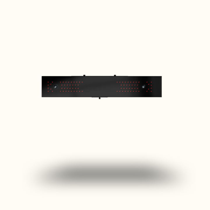 Black rectangular object with red lights on a white background