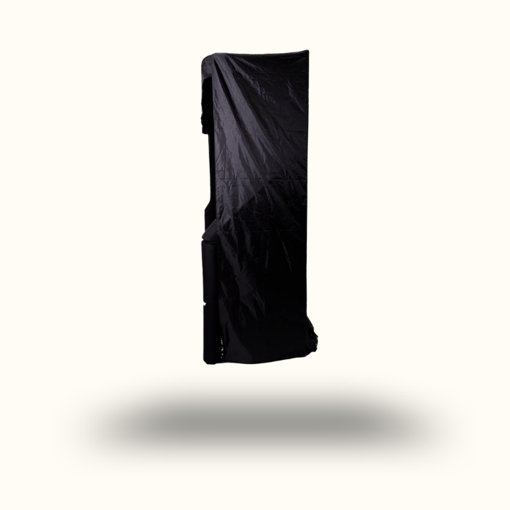Black rectangular object with a textured surface on a white background