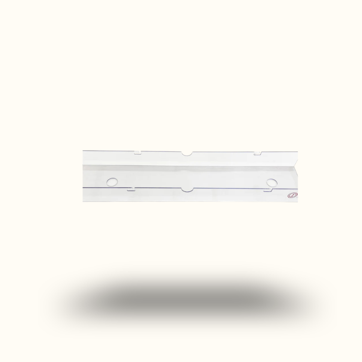 White rectangular object with cutouts on a white background