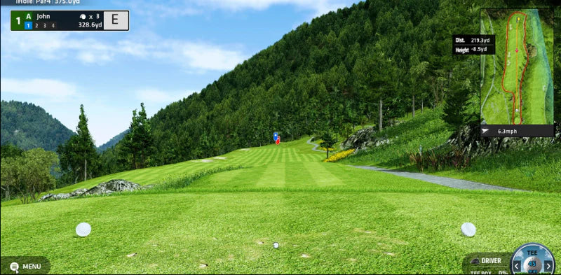 Golf course with trees and mountains in the background, viewed from a golf simulation software interface.
